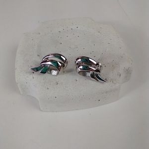 Silver Trifari clip earrings vintage swirl silver knot style